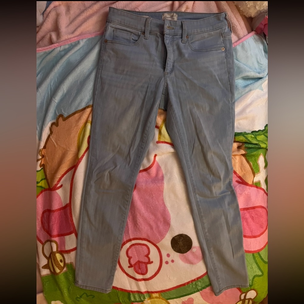Light denim universal thread jeans